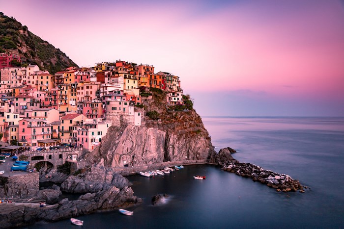 Manarola, Italy village on a cliffside at sunset