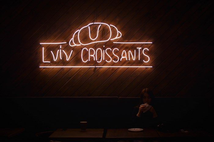 Lviv Croissants neon sign in a cafe