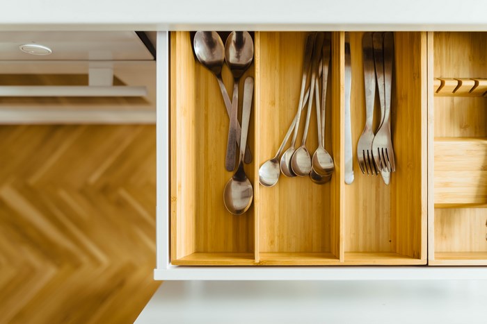 Kitchen drawer with cutlery and bamboo organizer