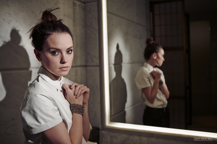 Daisy Ridley in a white shirt
