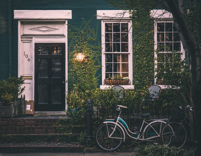 House with a bicycle parked outside