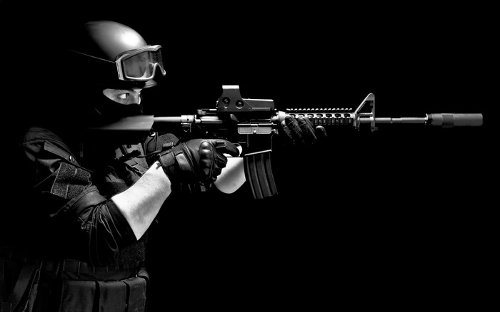 SWAT Officer Aiming Rifle