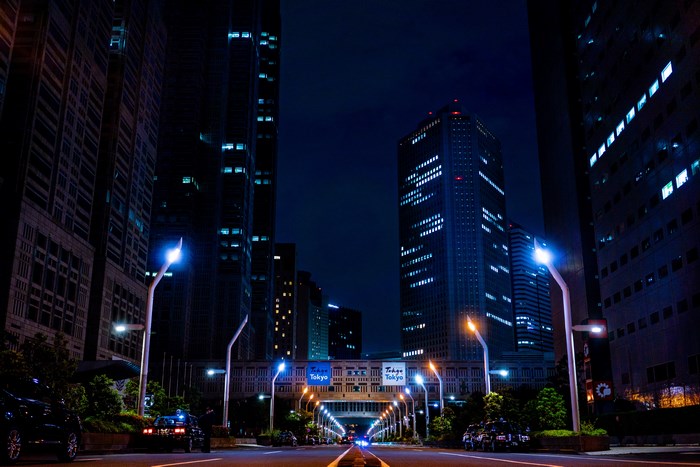Nighttime view of Tokyo street with skyscrapers