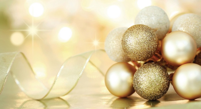 Christmas ornaments and ribbon with bokeh lights