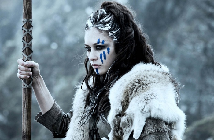 Olga Kurylenko with war paint and fur
