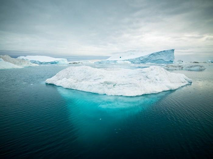 Icebergs floating in the ocean near Greenland