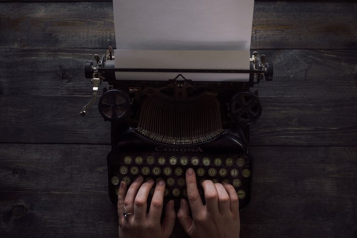 Corona Typewriter with Hands on Keys
