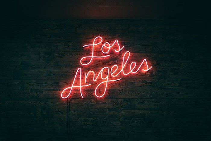 Red Neon Sign Saying Los Angeles on Dark Wall