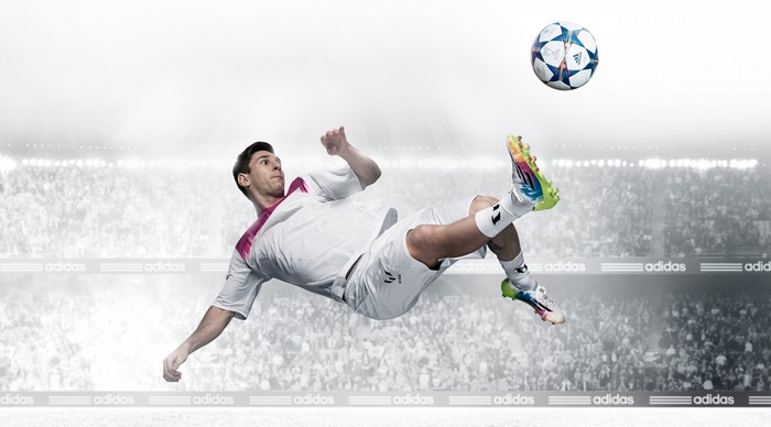 Lionel Messi performing a bicycle kick with Adidas ball