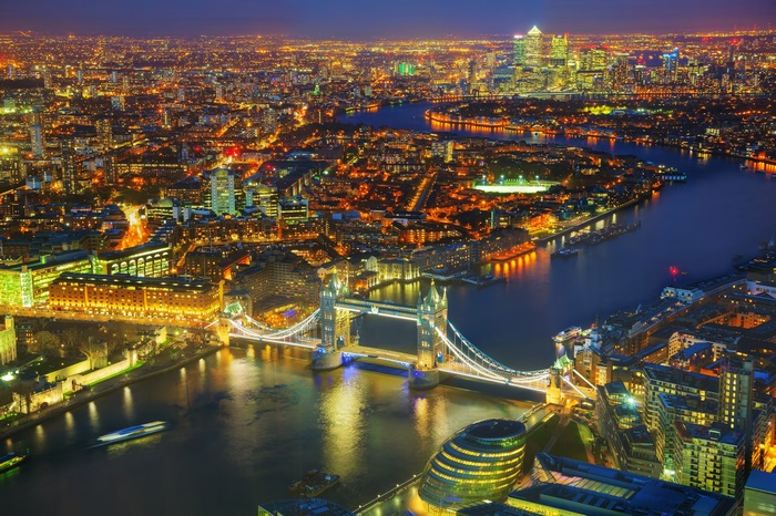 London cityscape at night with Tower Bridge