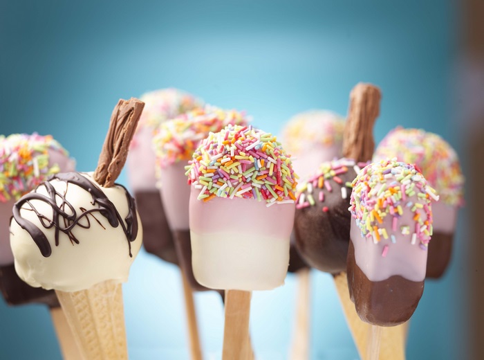 Ice cream pops with sprinkles and chocolate