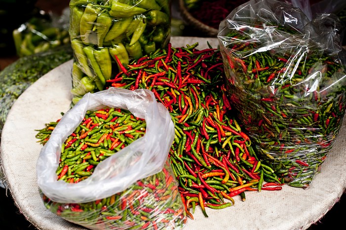 Colorful Red and Green Chili Peppers in Bags