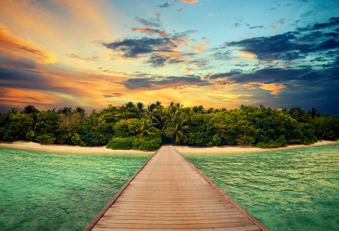 Island with wooden pier at sunset 4K