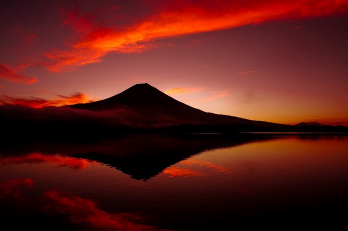 Mount Fuji at sunset reflected in a lake