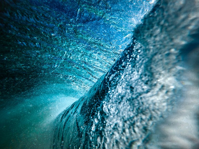 Underwater view of a breaking ocean wave