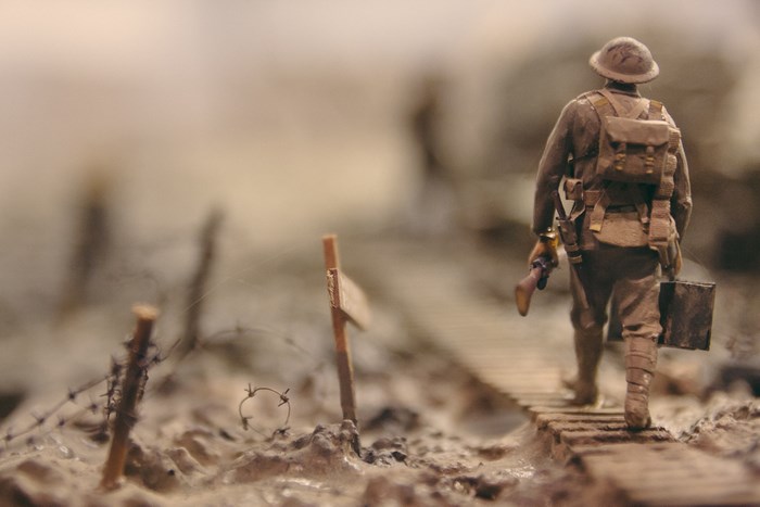 World War 1 soldier model walking on a wooden path