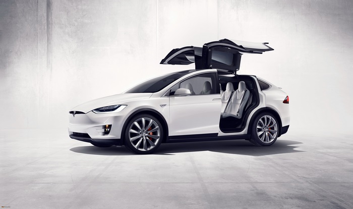 White Tesla Model X with Falcon Wing Doors Open