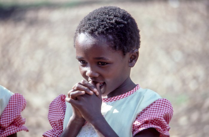 Portrait of a young African girl in sunlight