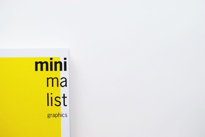Minimalist graphics book cover with yellow and black text