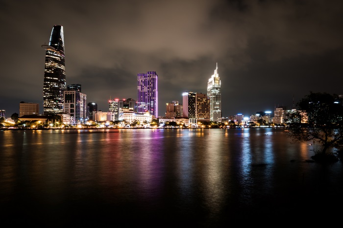 Ho Chi Minh City skyline at night with river