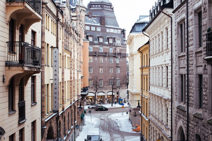 Finlandshuset building on a snowy street in a European city