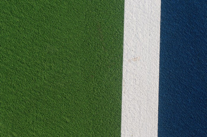 Green, white, and blue tennis court lines