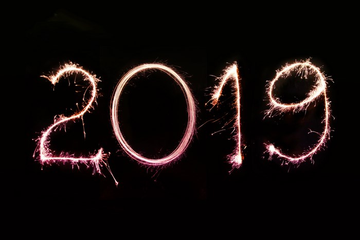 2019 sparkler light typography on black background