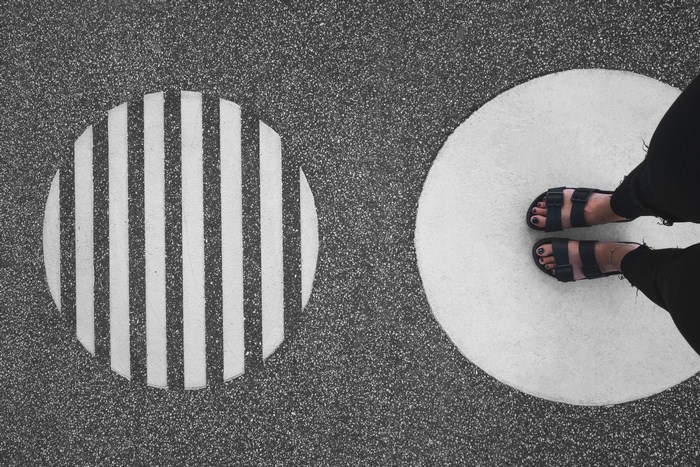 Futurium floor with geometric patterns and feet