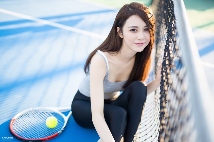 4K Portrait of Smiling Asian Woman on Tennis Court