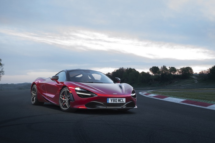 Red McLaren 720S on a Race Track