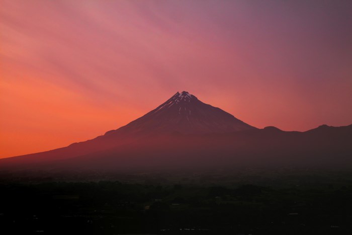 Mount Taranaki at sunset with colorful sky