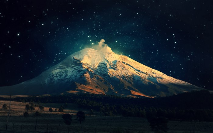 Popocatépetl volcano under a starry night sky
