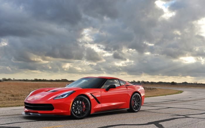 Red Chevrolet Corvette C7 on a Road