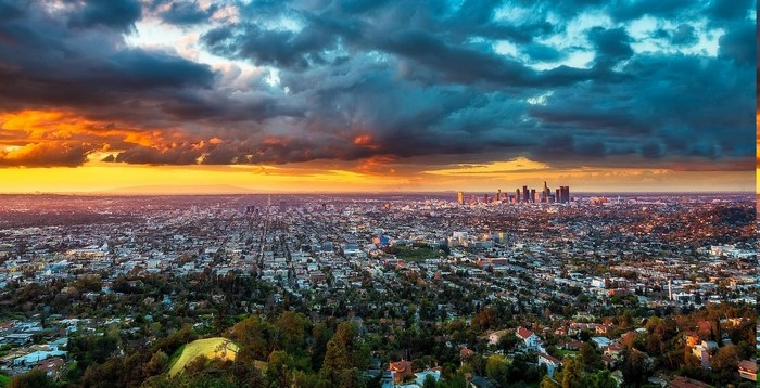 Los Angeles cityscape at sunset with dramatic clouds