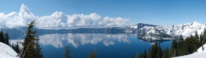 Crater Lake National Park with snow and clouds