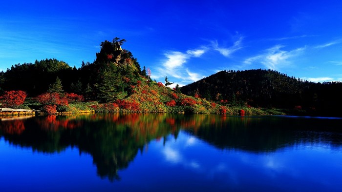 Autumn landscape with lake and colorful trees in Japan