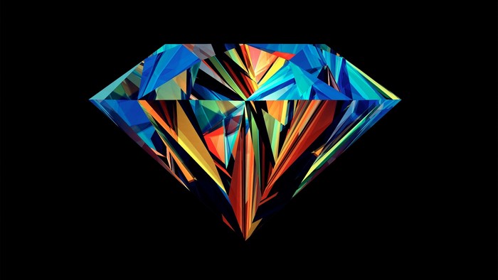 Abstract diamond with colorful facets on black background