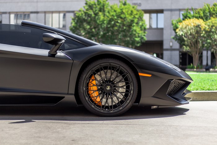 Matte black Lamborghini Aventador wheel and body