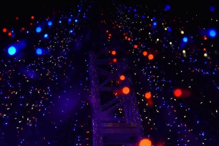 Night view of a structure covered in bokeh lights