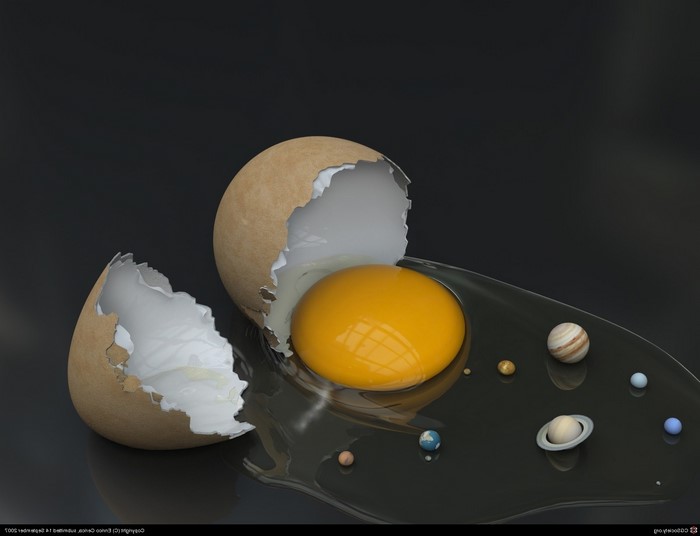 Cracked egg with planets resembling a solar system