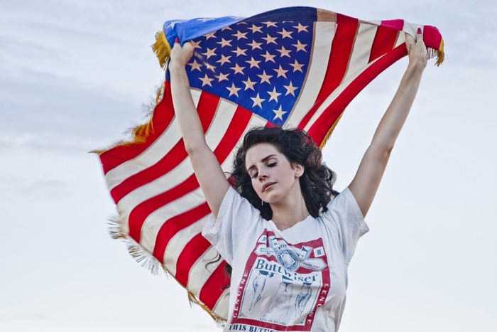 Lana Del Rey holding American flag