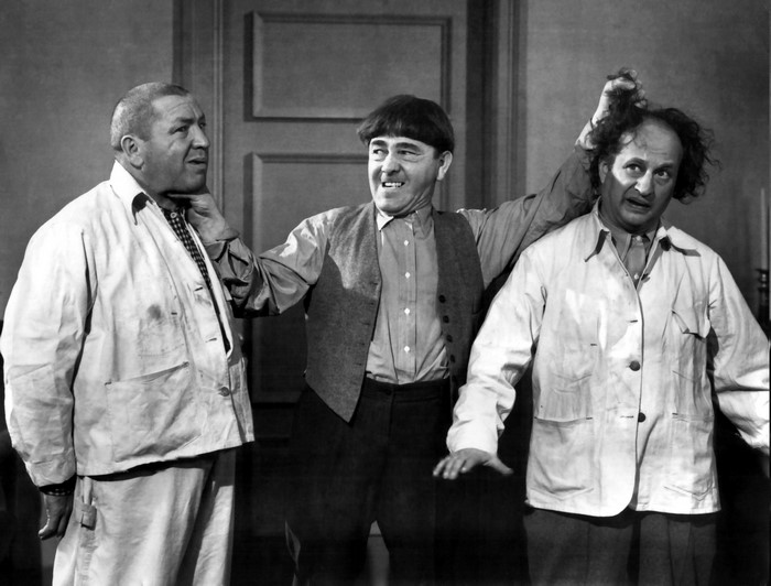 The Three Stooges in a monochrome scene