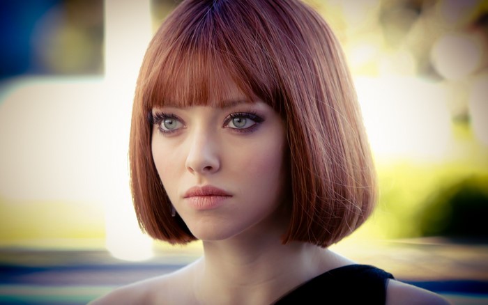 Amanda Seyfried with auburn hair and green eyes