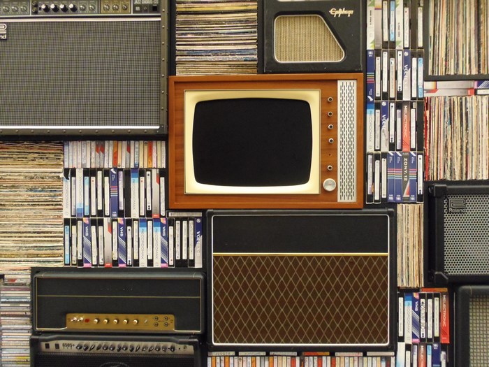 Vintage Television and Amplifiers with VHS Tapes and Records