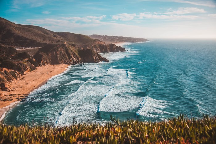 Pacifica Coastline with Waves and Mountains