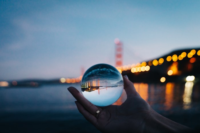 Golden Gate Bridge reflected in a crystal ball at night