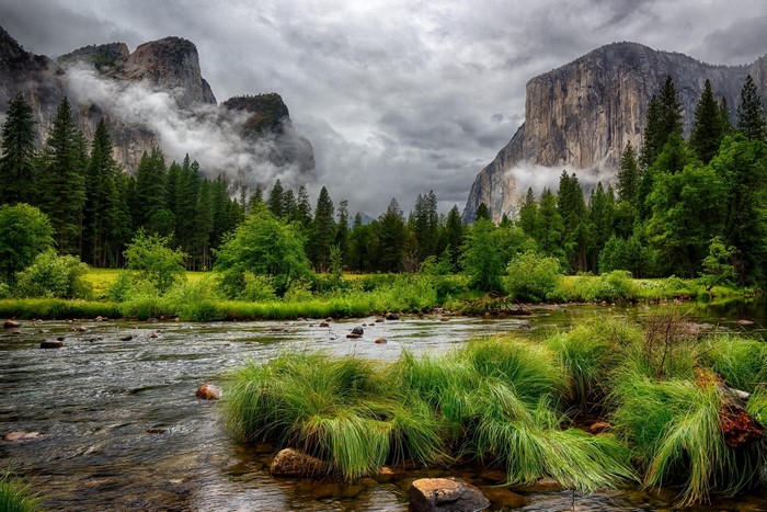 River flowing through Yosemite Valley with El Capitan and Cathedral Rocks