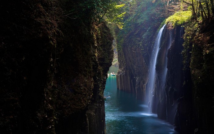 Serene Waterfall Flowing Through a Narrow Canyon in Japan
