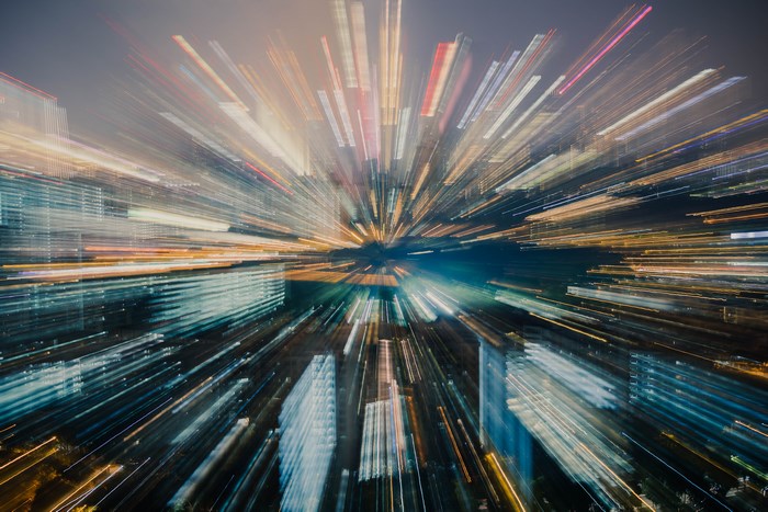 Cityscape with light trails and motion blur