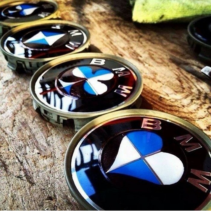 BMW wheel center caps with heart-shaped logos